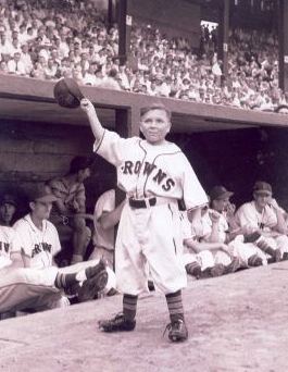 1952: St Louis Browns pitcher, Satchel Paige chats with teammates